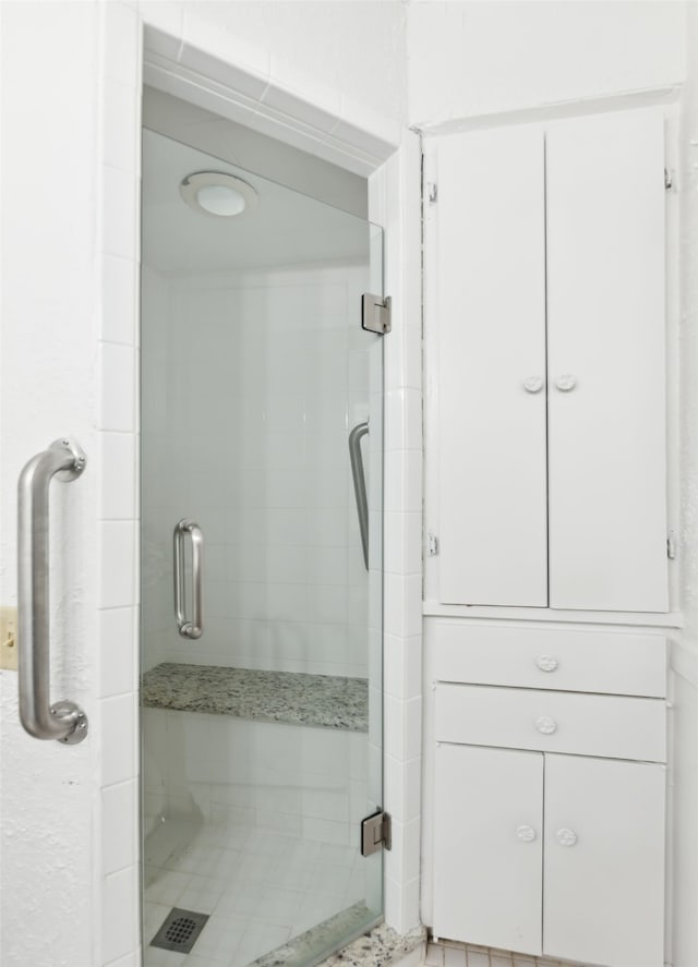 bathroom featuring walk in shower