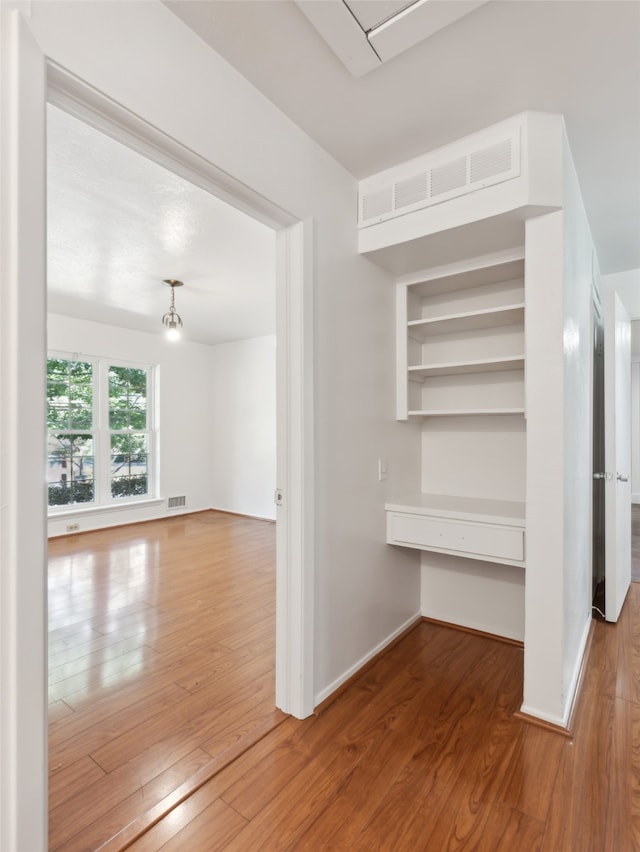 interior space with hardwood / wood-style flooring