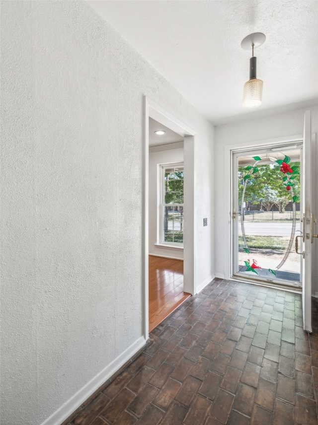 foyer with plenty of natural light