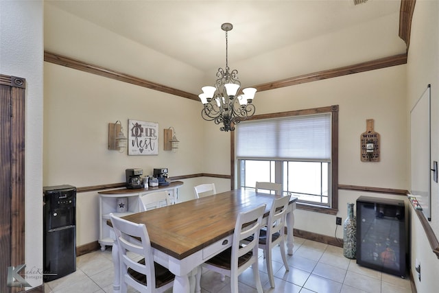 dining room featuring light tile patterned flooring and an inviting chandelier