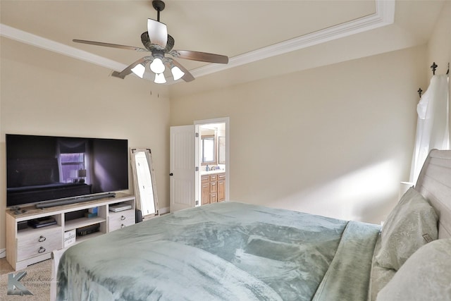 bedroom with ceiling fan, ornamental molding, and connected bathroom