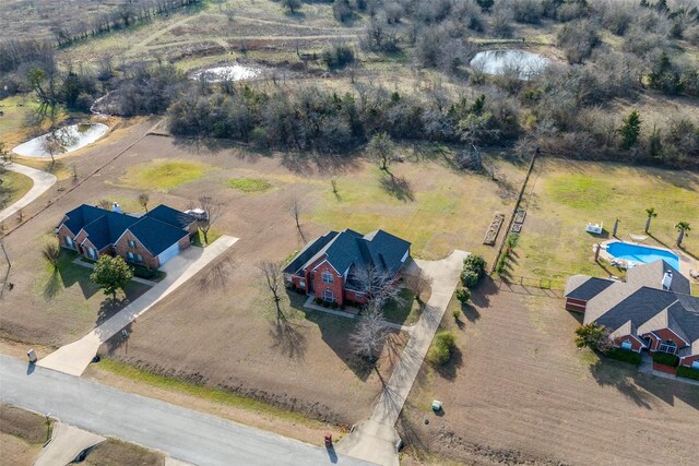 birds eye view of property featuring a rural view