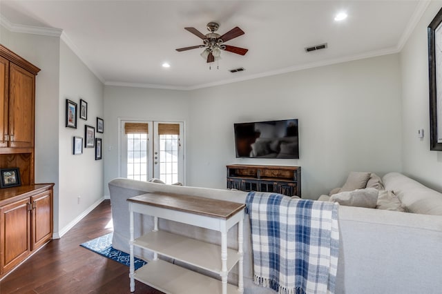 living room featuring ceiling fan, french doors, dark hardwood / wood-style flooring, and ornamental molding