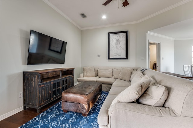 living room featuring ceiling fan, dark wood-type flooring, and ornamental molding