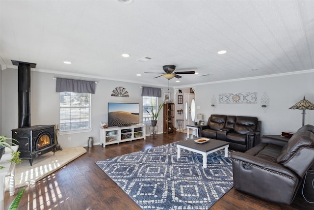 living room with a wealth of natural light and ornamental molding