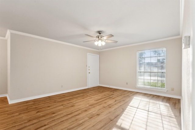 spare room with ceiling fan, crown molding, and light hardwood / wood-style flooring