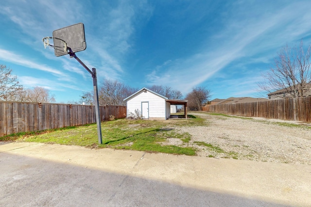 view of property exterior featuring an outbuilding