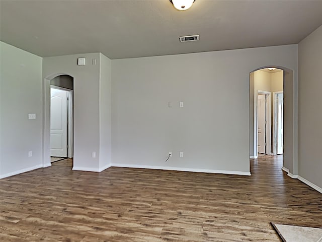 spare room featuring hardwood / wood-style flooring