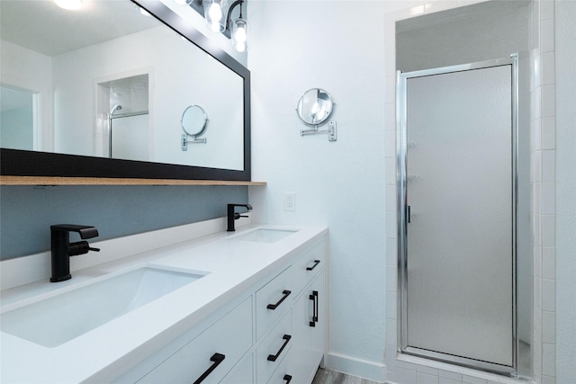 bathroom featuring vanity and walk in shower