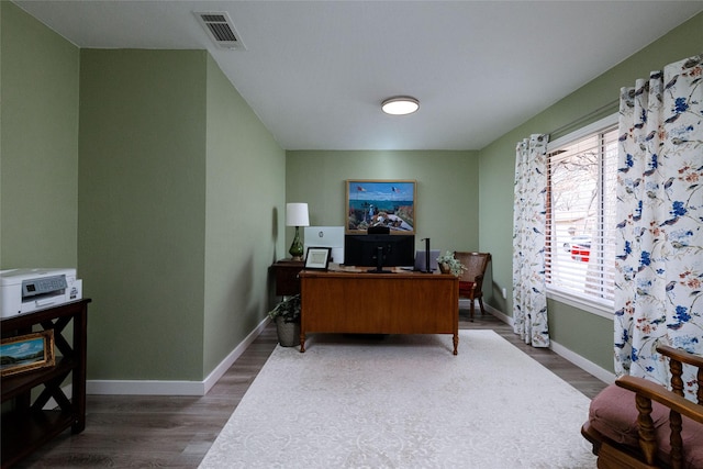 office area featuring dark hardwood / wood-style floors and a wealth of natural light