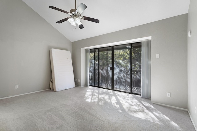 unfurnished bedroom featuring ceiling fan, light colored carpet, and high vaulted ceiling