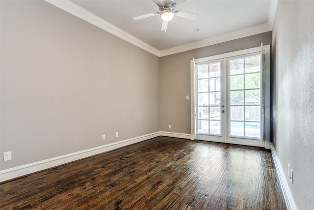 unfurnished room with ceiling fan, dark hardwood / wood-style flooring, ornamental molding, and french doors