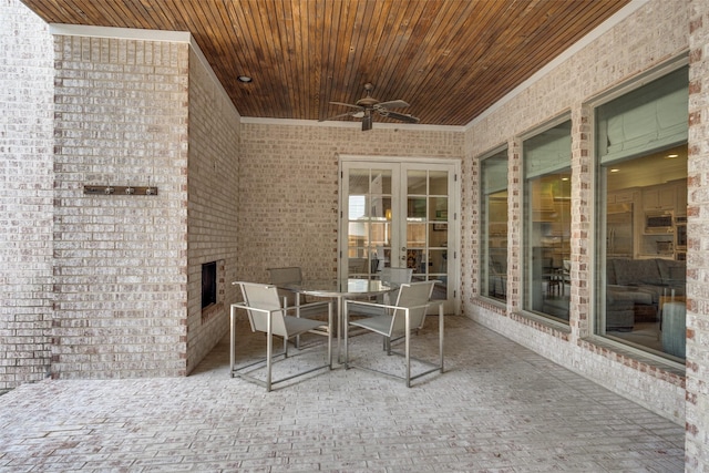 view of patio with ceiling fan and french doors