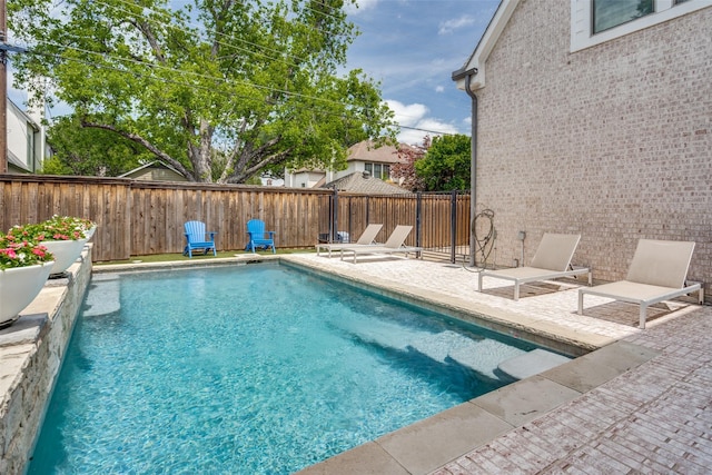 view of pool with a patio