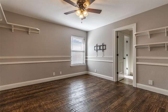 unfurnished bedroom featuring ceiling fan, a closet, and dark hardwood / wood-style flooring