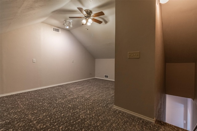 additional living space featuring ceiling fan, a textured ceiling, and vaulted ceiling