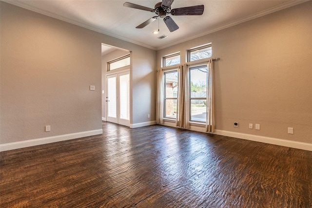 empty room with dark hardwood / wood-style floors, ceiling fan, ornamental molding, and french doors