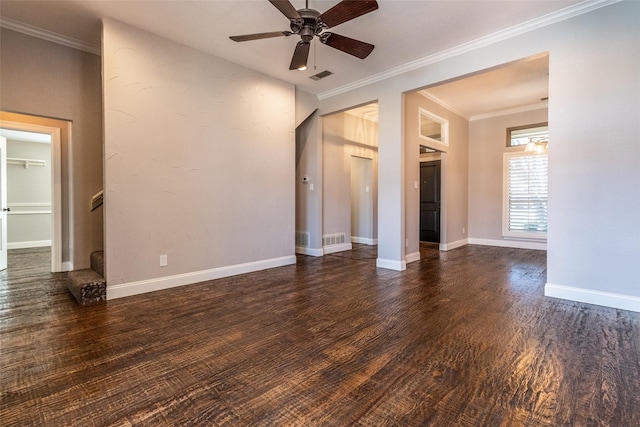 empty room featuring ceiling fan, dark hardwood / wood-style flooring, and crown molding