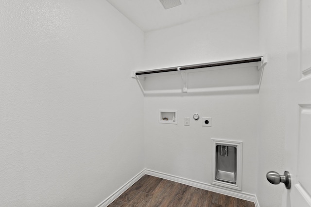 clothes washing area with hookup for a gas dryer, dark hardwood / wood-style flooring, washer hookup, and electric dryer hookup