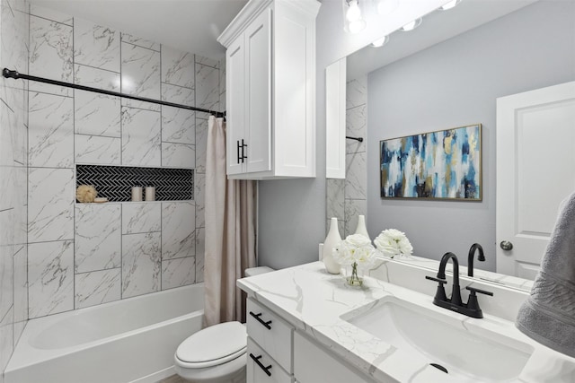 full bathroom featuring shower / bath combo with shower curtain, toilet, and vanity