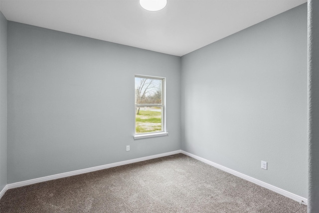 empty room with carpet flooring