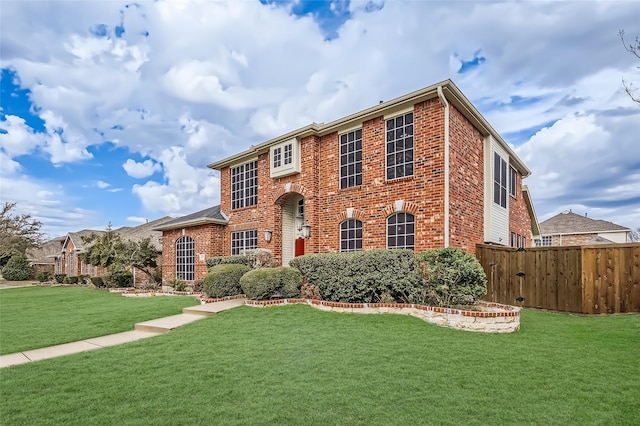 view of front of property with a front lawn