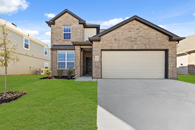 craftsman house featuring an attached garage, a front yard, concrete driveway, and brick siding