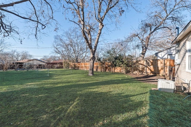 view of yard featuring central AC