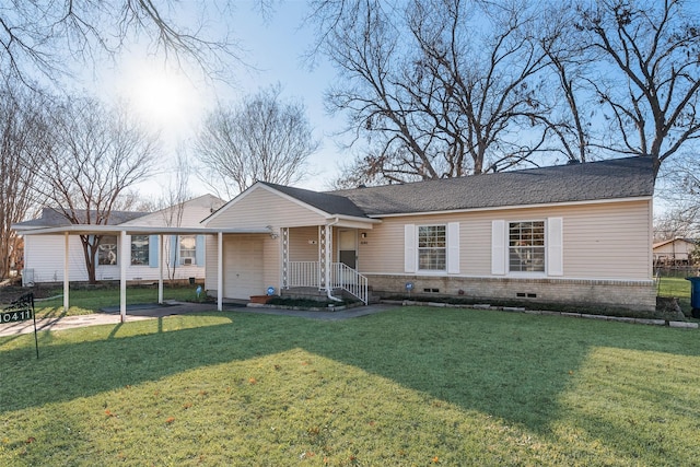 ranch-style home with a garage and a front yard