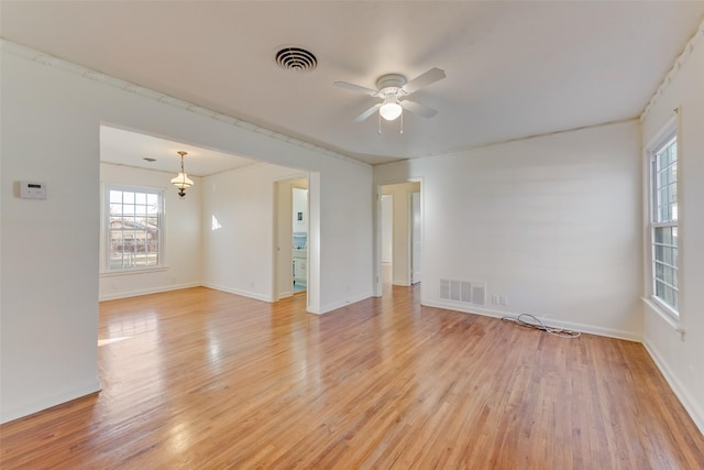 unfurnished room featuring ceiling fan and light hardwood / wood-style flooring