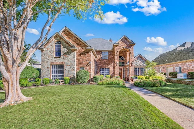 view of front of property with a front lawn