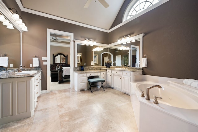 bathroom featuring ornamental molding, a washtub, ceiling fan, and vanity