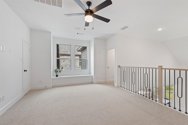 empty room with plenty of natural light and visible vents