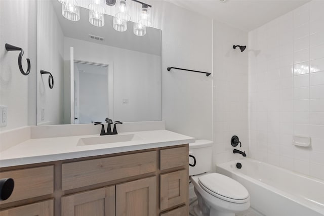 full bath with toilet, visible vents, tub / shower combination, and vanity