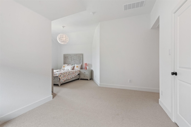 unfurnished bedroom with baseboards, visible vents, and carpet flooring