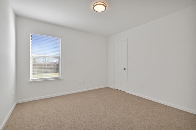 unfurnished room with carpet flooring