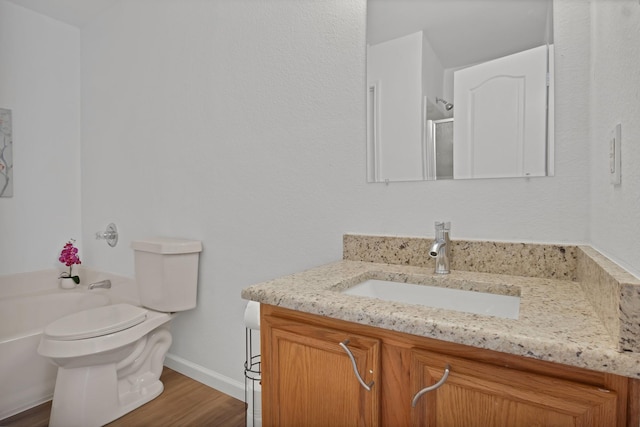 full bath with toilet, vanity, a bath, wood finished floors, and walk in shower