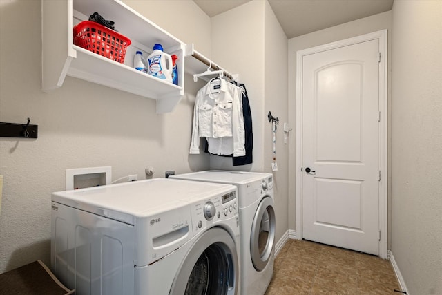 washroom with separate washer and dryer