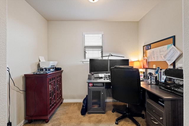 view of carpeted office space