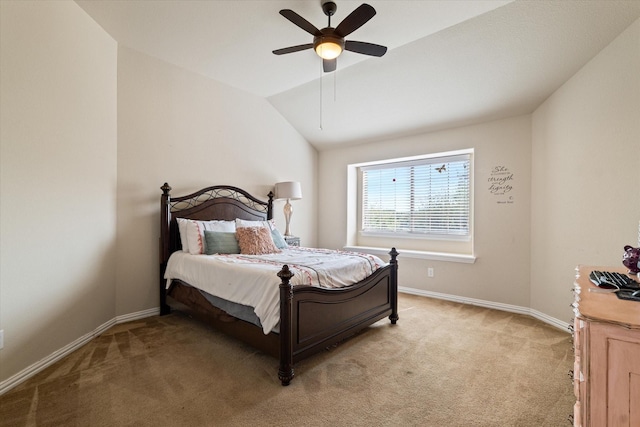 bedroom featuring ceiling fan, light colored carpet, and lofted ceiling