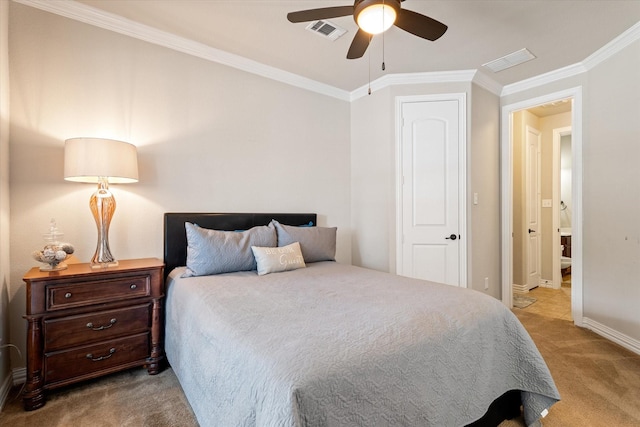 carpeted bedroom featuring crown molding and ceiling fan