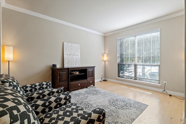 bedroom featuring crown molding and light hardwood / wood-style floors