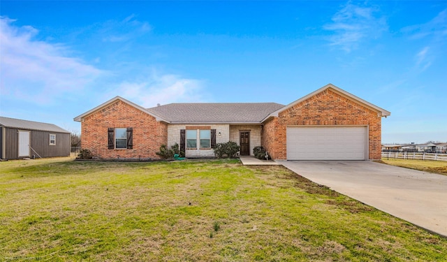 ranch-style house featuring a garage and a front lawn