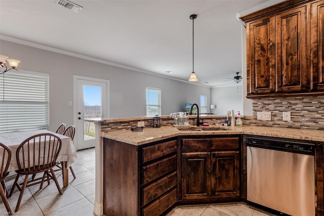 kitchen with dark brown cabinets, stainless steel dishwasher, sink, light tile patterned floors, and ornamental molding