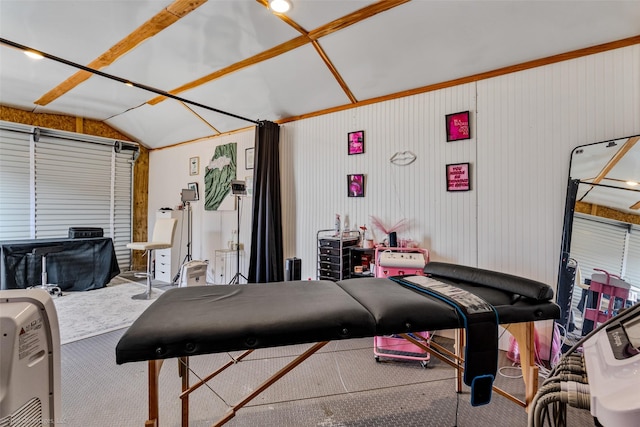 carpeted living room featuring vaulted ceiling