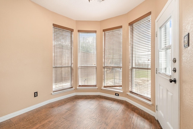 interior space with hardwood / wood-style flooring