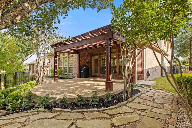 view of patio featuring a pergola