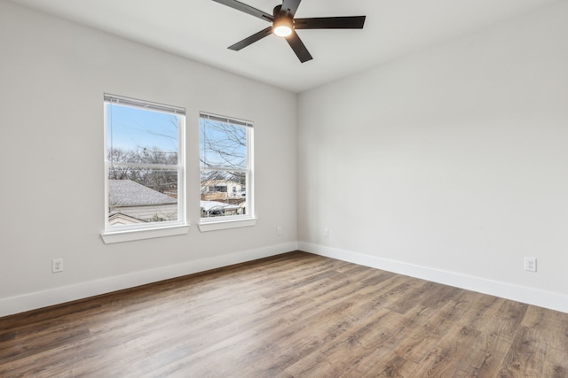 unfurnished room featuring ceiling fan and wood-type flooring