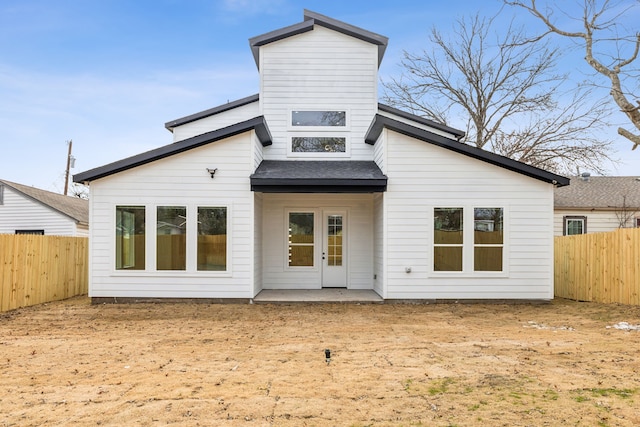 rear view of property with a patio