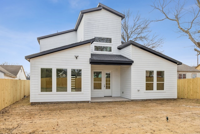 back of house with a patio area